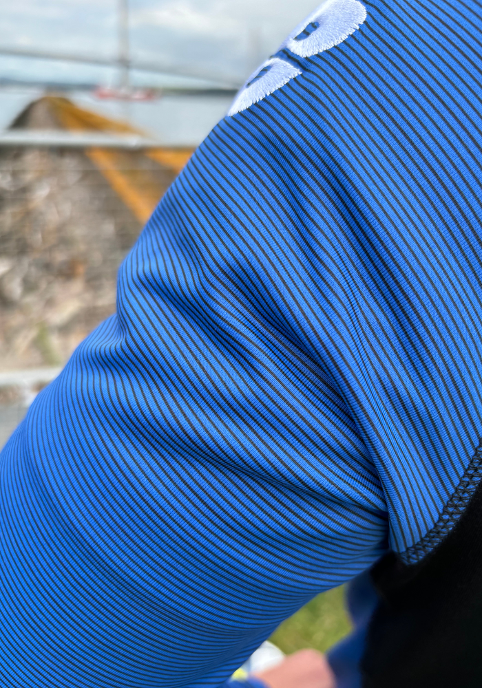 PERFORMANCE QUARTER ZIP TOP BLACK/ROYAL BLUE