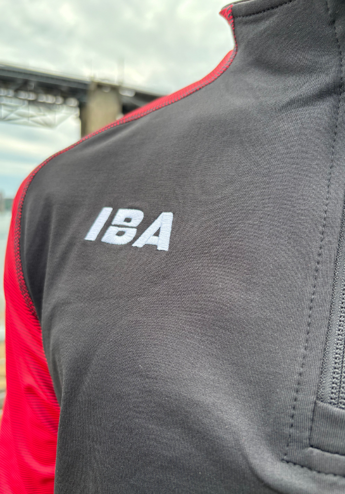 PERFORMANCE QUARTER ZIP TOP BLACK/RED