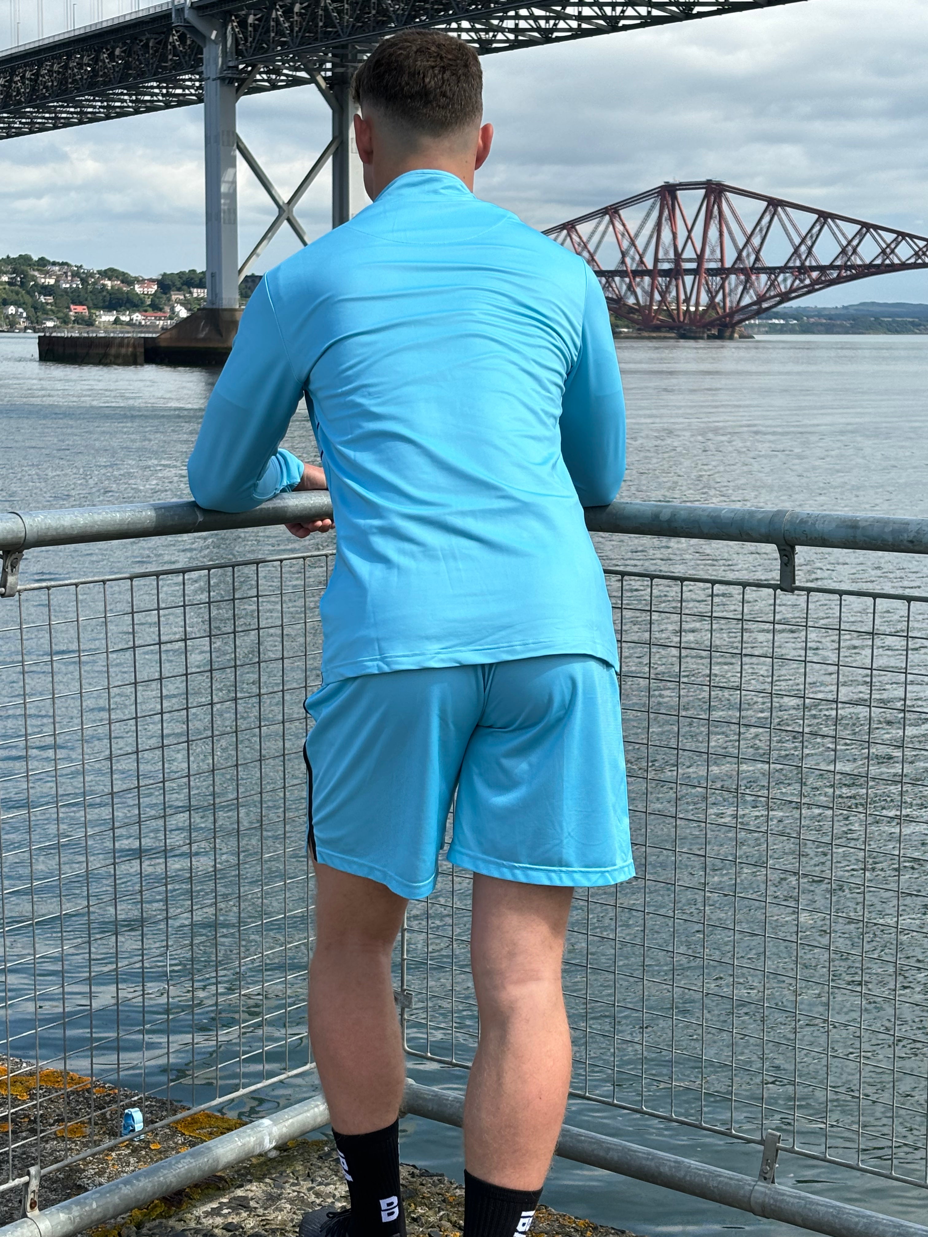 EDGE QUARTER ZIP TOP SKY BLUE