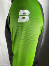 PERFORMANCE QUARTER ZIP TOP BLACK/GREEN