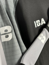 PERFORMANCE QUARTER ZIP TOP BLACK/GREY