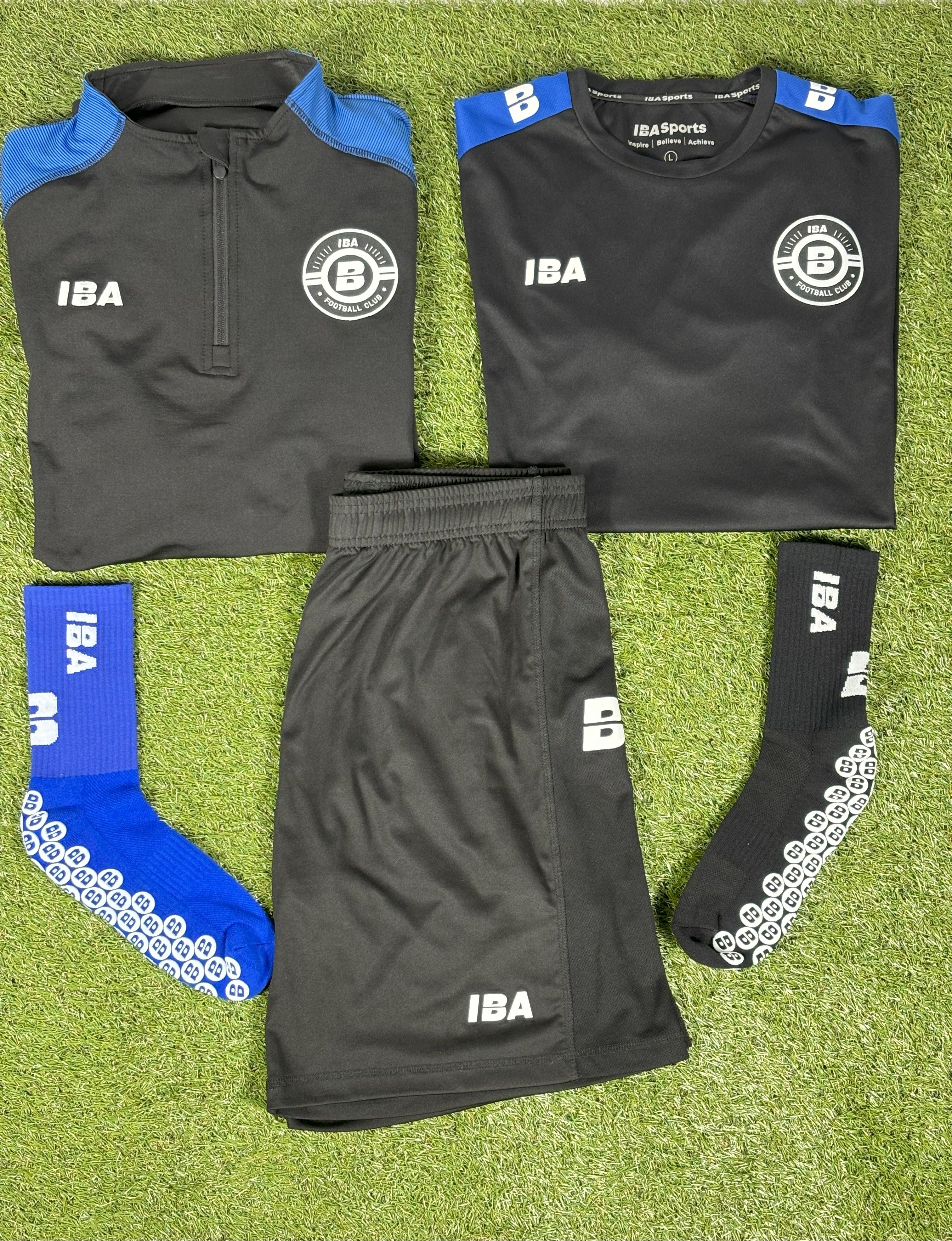 PERFORMANCE QUARTER ZIP TOP BLACK/ROYAL BLUE