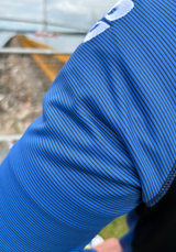 PERFORMANCE QUARTER ZIP TOP BLACK/ROYAL BLUE