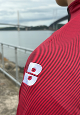 PERFORMANCE QUARTER ZIP TOP BLACK/RED