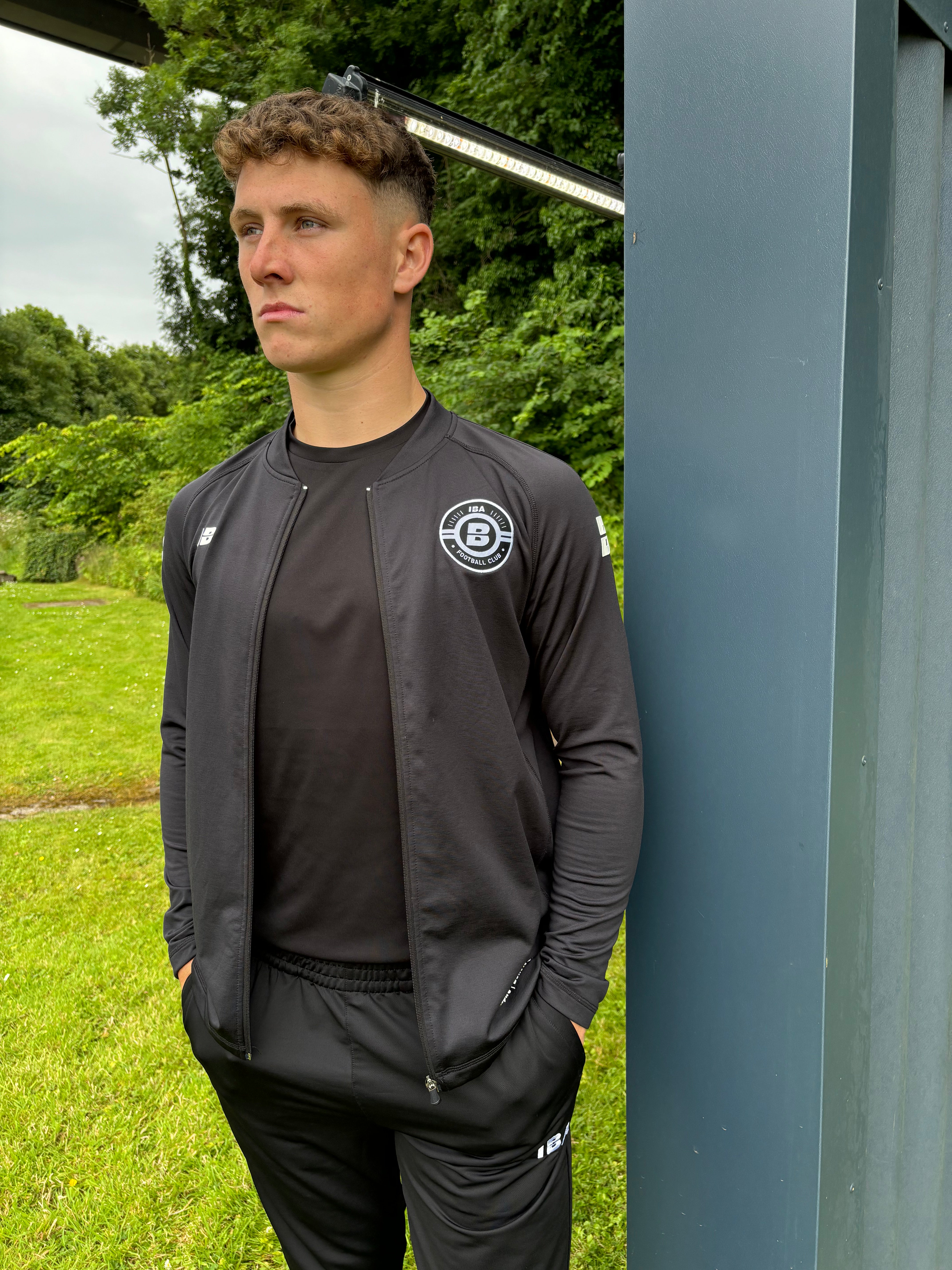 PITCHSIDE FULL ZIP TOP BLACK